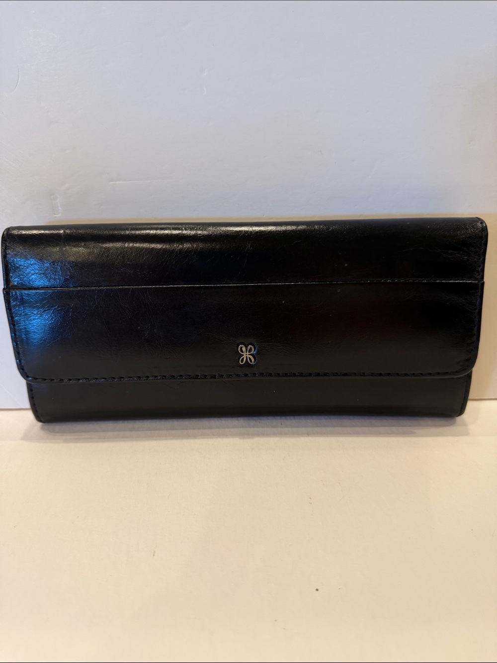 HOBO Black Leather Long Flap Wallet with Logo Accent
